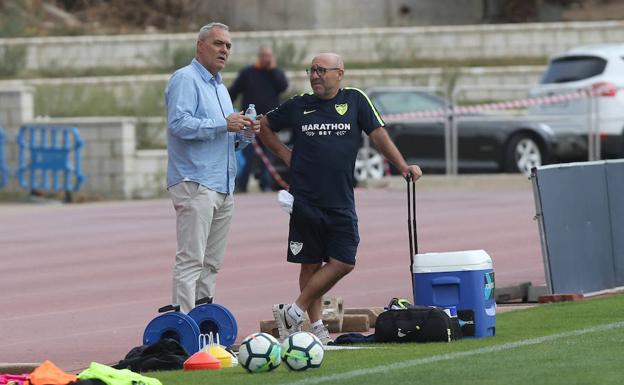 Husillos y Torrontegui, durante un entrenamiento del Málaga. /SUR