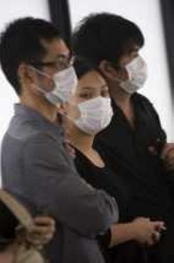 En China se protegen./ EFE/
