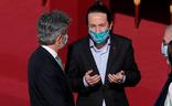 El vicepresidente Pablo Iglesias dialoga con el presidente del Tribunal Supremo, Carlos Lesmes, en el Día de la Fiesta Nacional./EFE